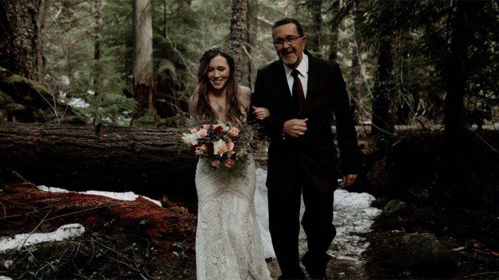 A bride and her father walking to their Mt Hood elopement.