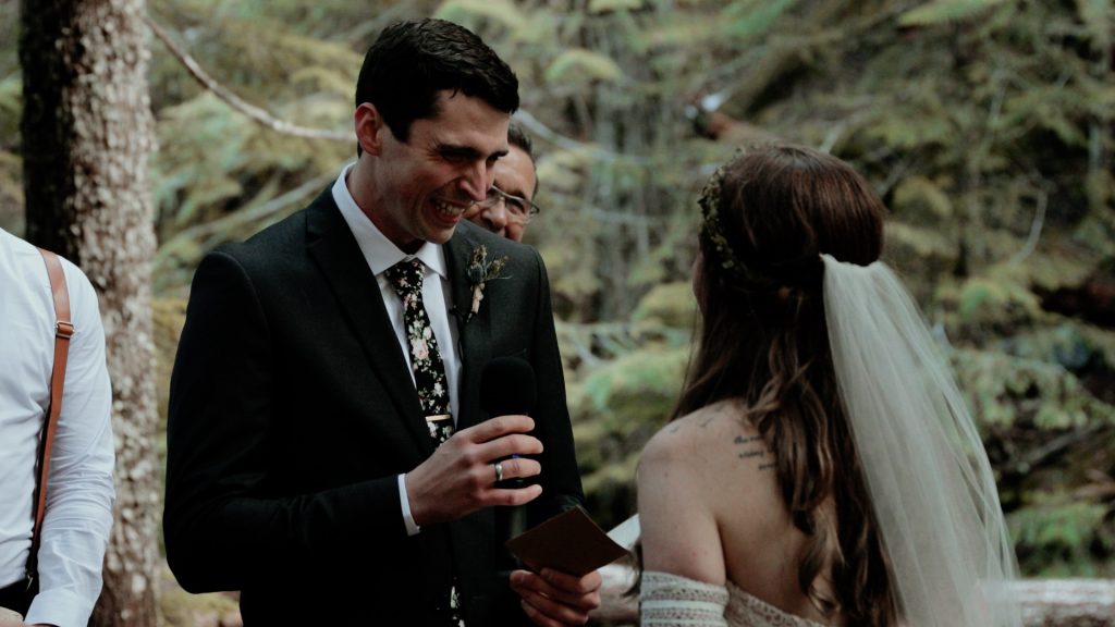 A groom smiling at his bride during their Mt Hood elopement.