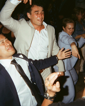 a 3d photo of the groom and his friends dancing